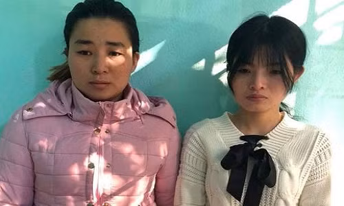 Đỗ Ngọc Anh và Hoàng Thị Ánh Sáng bị bắt giữ. Ảnh: C.A.