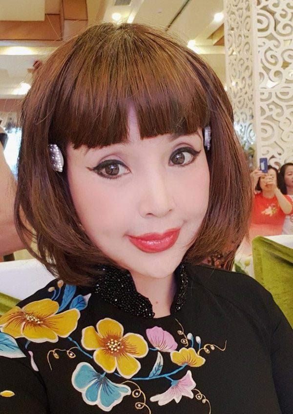 Nhan sắc gây tranh cãi của NSND Lan Hương ở tuổi U60 - Hình 2 Nhan sac gay tranh cai cua NSND Lan Huong o tuoi U60-Hinh-2