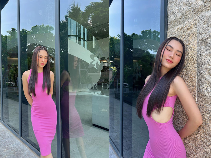 Váy ôm sát, cut out phần eo giúp Mai Phương tự tin tạo dáng.