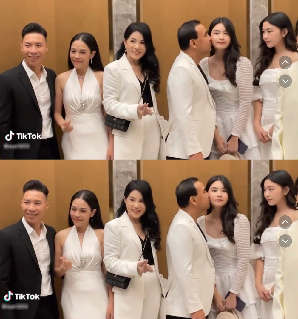 Chụp ảnh bên vợ chồng O Sen Ngọc Mai và Quốc Nghiệp, nam MC gây chú ý với hành động cưng chiều con gái út. Ảnh: TikTok @xun1203