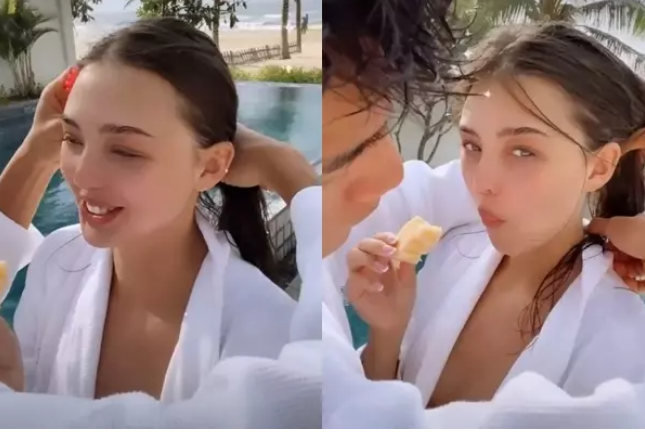 Trong một số hình ảnh cho thấy chàng thủ thành hết mực quan tâm, chăm sóc cho bạn gái ngay bên hồ bơi.