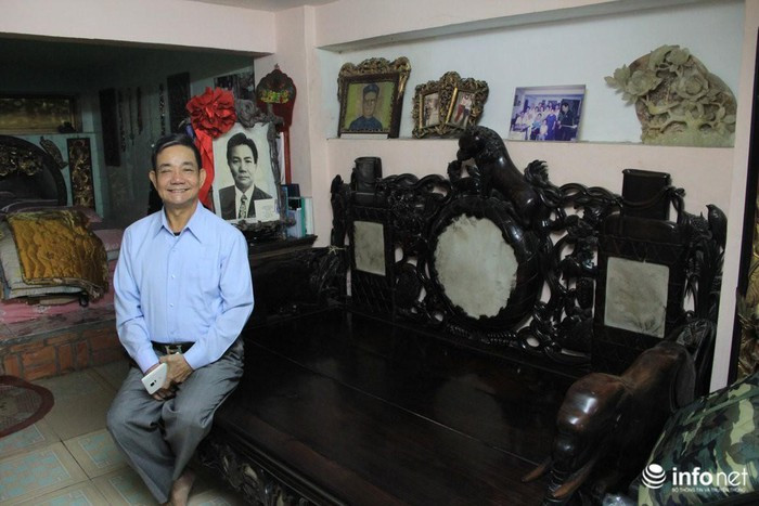 Trong đó phải kể đến bộ sập 300 năm tuổi nguồn gốc từ Trung Quốc. Chiếc sập được làm nguyên miếng bằng gỗ lệ chi (cây vải có tuổi hàng ngàn năm), chạm khắc rất tinh xảo. Ảnh: Infonet.