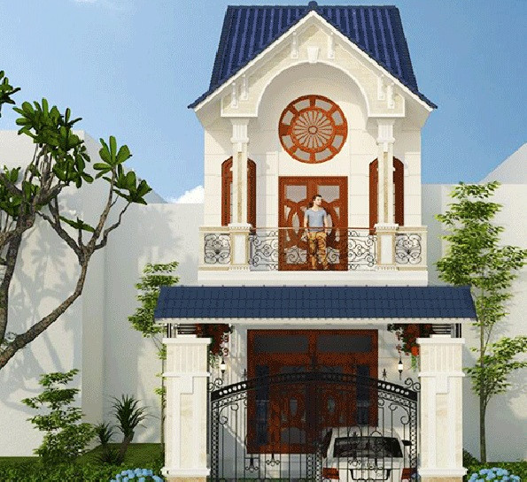 Nhà ống kiểu Pháp 2 tầng thiết kế tinh tế với trụ cột thẳng đứng và nhiều chi tiết trang trí độc đáo. Ảnh: Nha360.