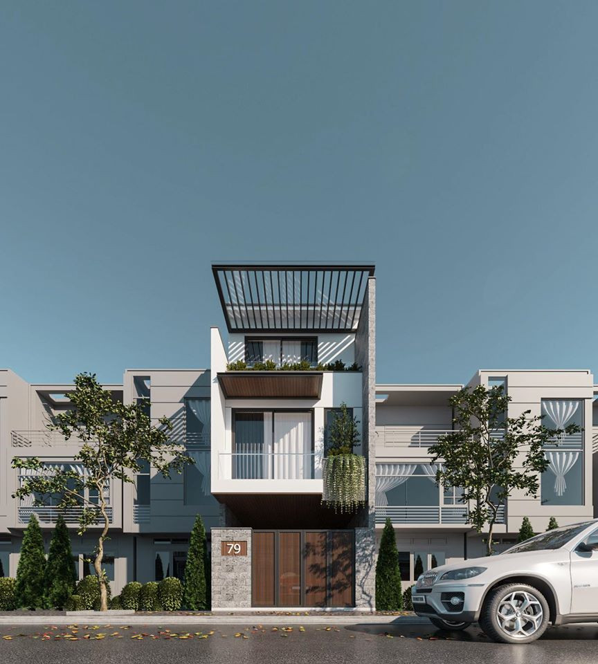 Mặt tiền nhà ống 3 tầng tinh tế về hình khối, bố cục màu sắc nhưng vẫn đảm bảo các yếu tố thông gió và lấy sáng. Ảnh: Holcim.