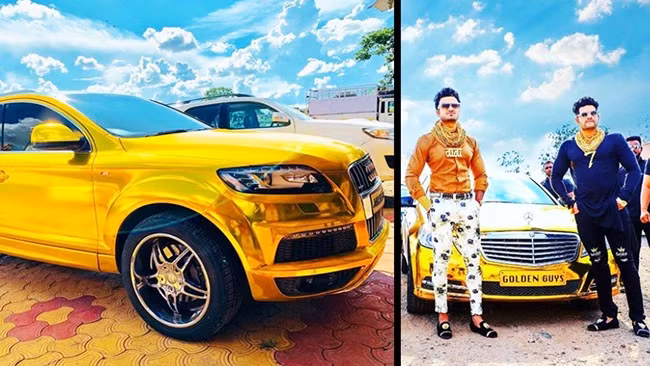 Đôi bạn thân đam mê vàng cũng sở hữu SUV hạng sang Audi Q7 được dán đề-can vàng crôm trị giá 2,6 tỷ đồng. Nguồn ảnh: QQ. Video: BlackBerry Priv mạ vàng 24K giá 25 triệu ở Việt Nam. Nguồn: VTC1