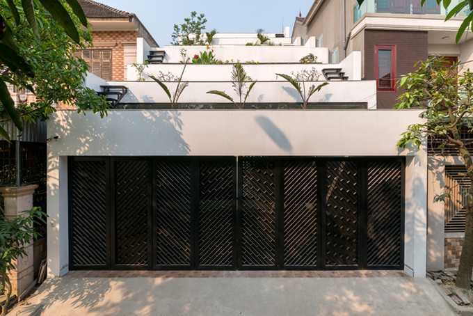 Một ngôi nhà 4 tầng mô phỏng ruộng bậc thang ở Hà Tĩnh của nhóm kiến trúc sư H&amp;P Architects đã đạt nhiều giải thưởng uy tín về kiến trúc. Ảnh: H&amp;P Architects.