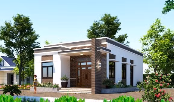 Nhà cấp 4 mái bằng được thiết kế theo phong cách hiện đại, sử dụng sơn tường màu trắng và gạch ốp trang trí. Ảnh: Vtkong.