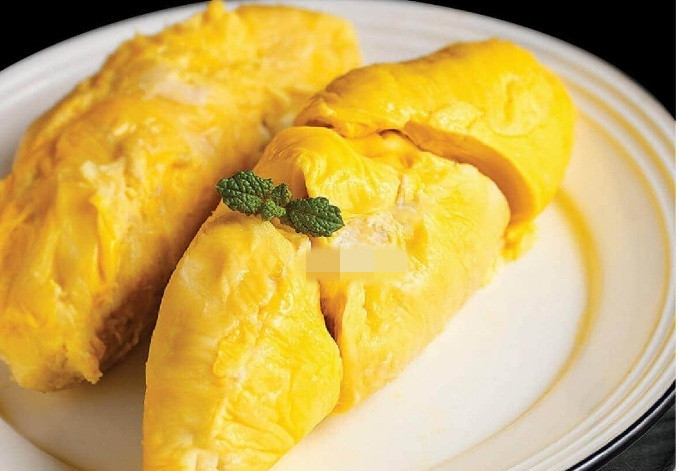 Thế nhưng, giữa lúc sầu riêng Việt có giá giảm sâu nhất từ trước đến nay thì trên thị trường loại sầu riêng Malaysia (thương hiệu Musang King) có giá tiền triệu vẫn hút khách. Ảnh: Vinfruits.