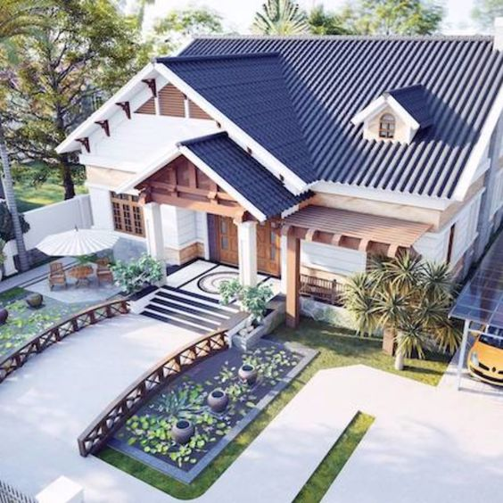 Măt tiền với hồ nước tự nhiên và cây cầu bắc qua gợi vẻ đẹp mộc mạc, truyền thống. Ảnh: Wedo.