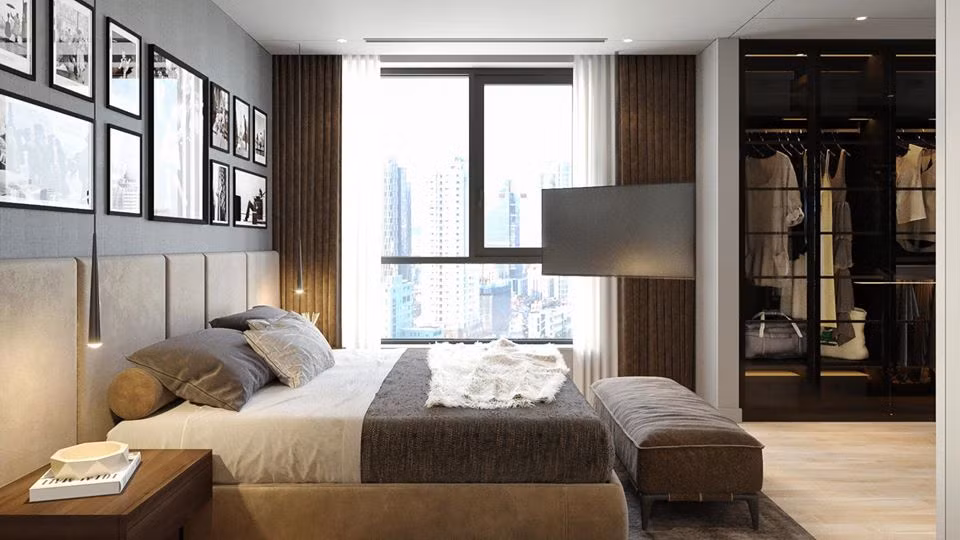 Phòng ngủ sử dụng gam màu trầm chủ đạo mà sang trọng.