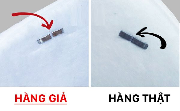 Trên khẩu trang 3M thật đầu ghim giữ dây đeo khá “sít”, còn hàng giả có vẻ “rộng rãi” hơn.Ảnh: Quantrimang.