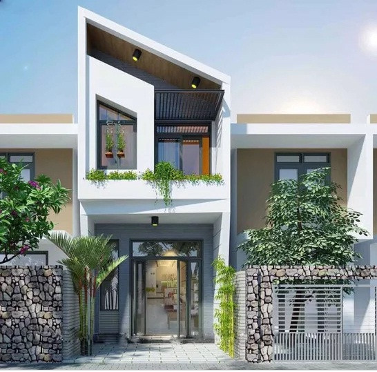 Điểm nhấn của ngôi nhà nằm ở kiến trúc mái chéo và những chậu cây, bồn cỏ được bố trí khắp không gian. Ảnh: Internet.