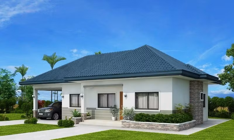 Đáp ứng nhu cầu của gia đình, nhà cấp 4 mái thái thiết kế gara ô tô ngay cạnh phía ngoài, giáp với san vườn. Ảnh: Wedo.