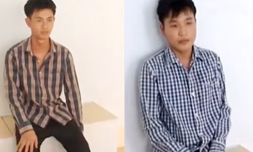 Nguyễn Minh Tấn và Trần Chí Hiếu tại cơ quan công an.