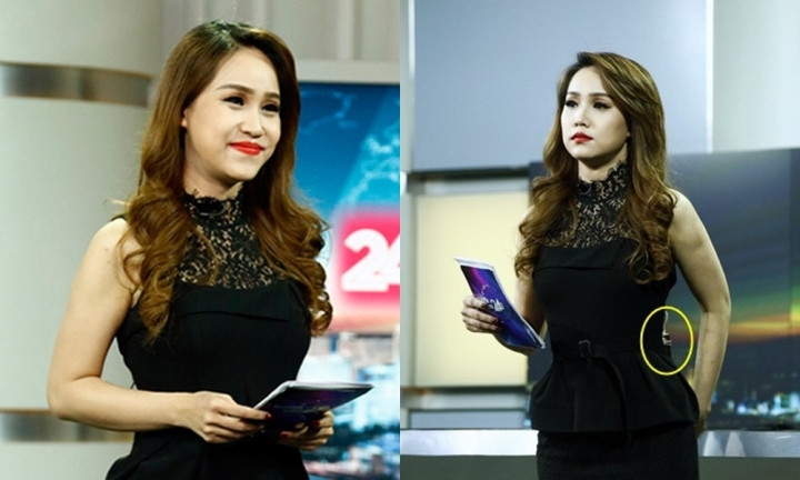 BTV Trúc Mai để lộ việc dùng kẹp giấy để xử lý chiếc váy quá rộng so với vóc dáng.