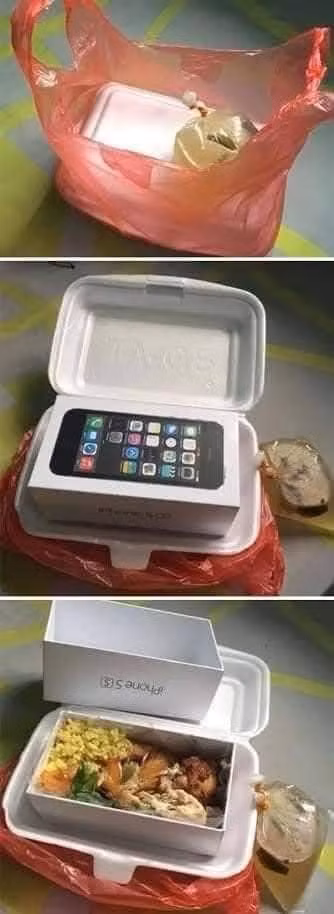 Người tặng quà đã vô cùng khéo léo và sáng tạo khi sử dụng chiếc hộp điện thoại iphone để làm hộp đựng cơm, đây được coi là màn "troll" người nhận cực đỉnh.