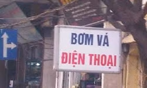 Một tấm biển quảng cáo "hai trong một" khiến người đọc liên tưởng đến một dịch vụ mới "bơm vá điện thoại".