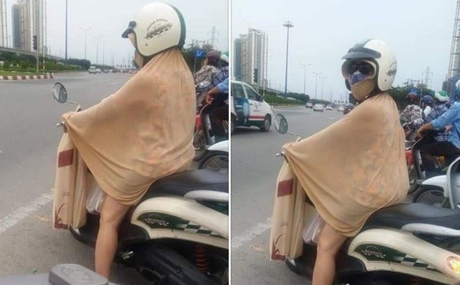 Người phụ nữ này khiên dân tình choáng váng khi lấy chiếc khăn mỏng quấn quanh người và mặt để chống nắng. Tuy nhiên độ dày của chiếc khăn khiến người ta hoài nghi về tác dụng của nó.