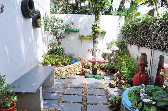 Tận dụng chai nhựa, giày cũ trồng cây có ngay khu vườn đẹp - Hình 6 Tan dung chai nhua, giay cu trong cay co ngay khu vuon dep-Hinh-6