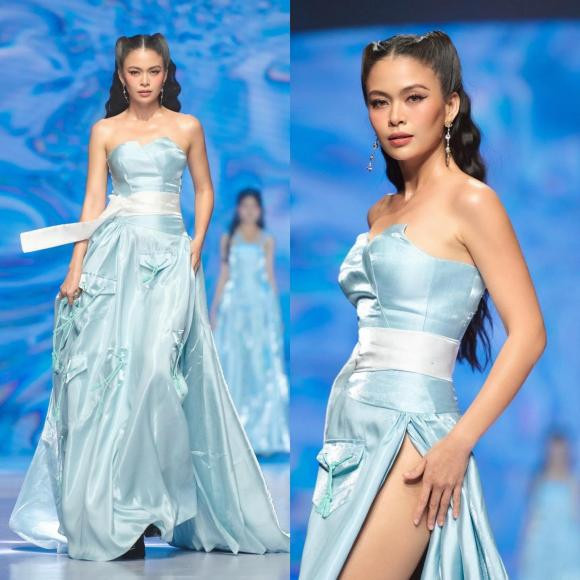 Á hậu Mâu Thủy sải bước trên sàn diễn.