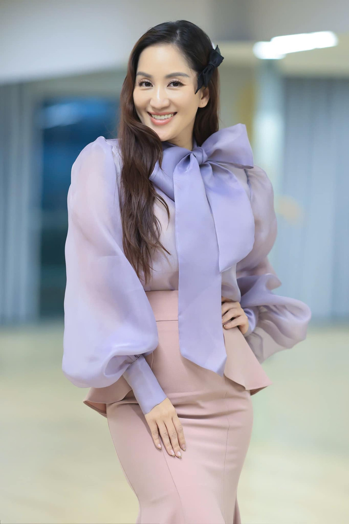 Sau 1 năm sinh con thứ 3, "nữ hoàng dancesport" Khánh Thi đã giảm đi 10 kg và lấy lại vóc dáng thon gọn. Ảnh: FB Nguyen Khanh Thi