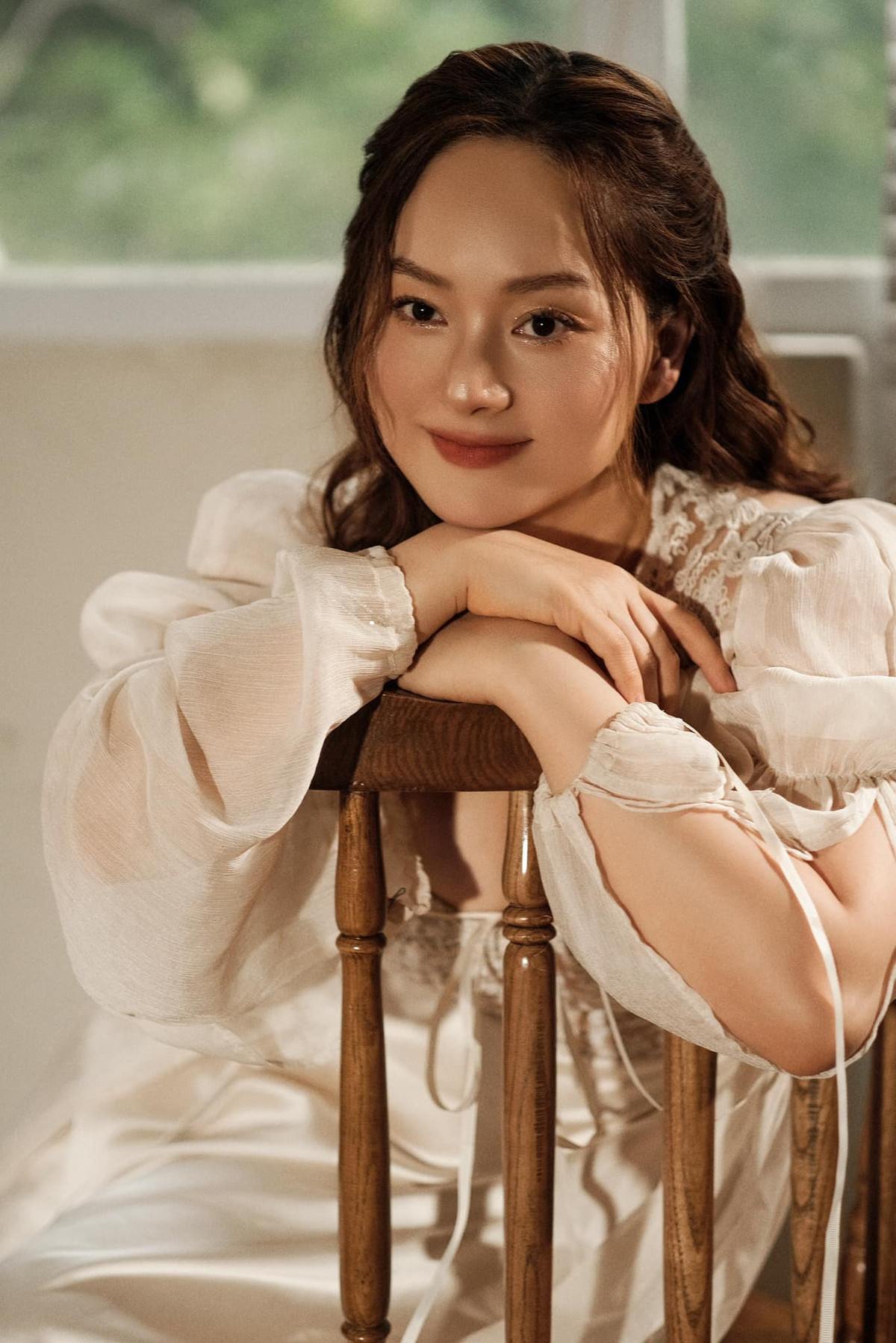 "Cuộc sống như chiếc gương, bạn chỉ nhận được kết quả tốt đẹp nhất khi mỉm cười với nó", Lan Phương tâm niệm. Ảnh: FB Lan Phuong Nguyen