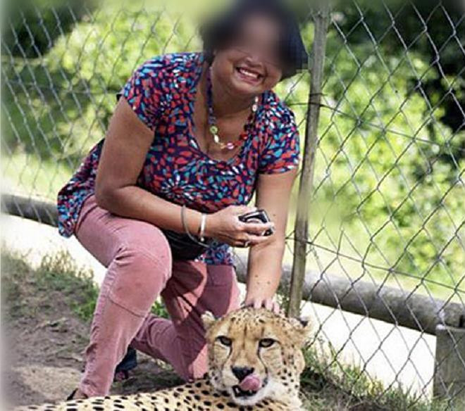 Chụp ảnh sống ảo, người phụ nữ bị báo đốm ngoạm tóc lôi đi Chup anh song ao, nguoi phu nu bi bao dom ngoam toc loi di