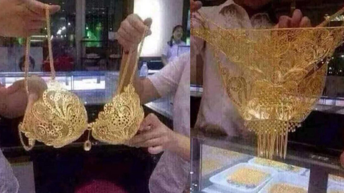 Một trung tâm thương mại tại thành phố Pingliang, tỉnh Cam Túc ( rung Quốc) đã tổ chức một buổi trình diễn thời trang với những bộ bikini bằng vàng.