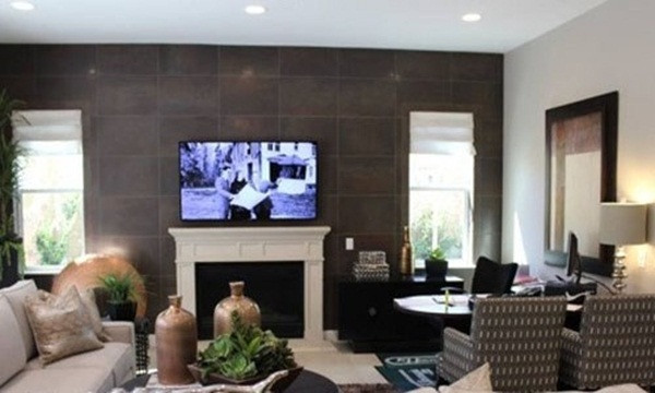 Phòng khách gồm lò sưởi, ghế salon và bàn làm việc. Ảnh: FBNV.