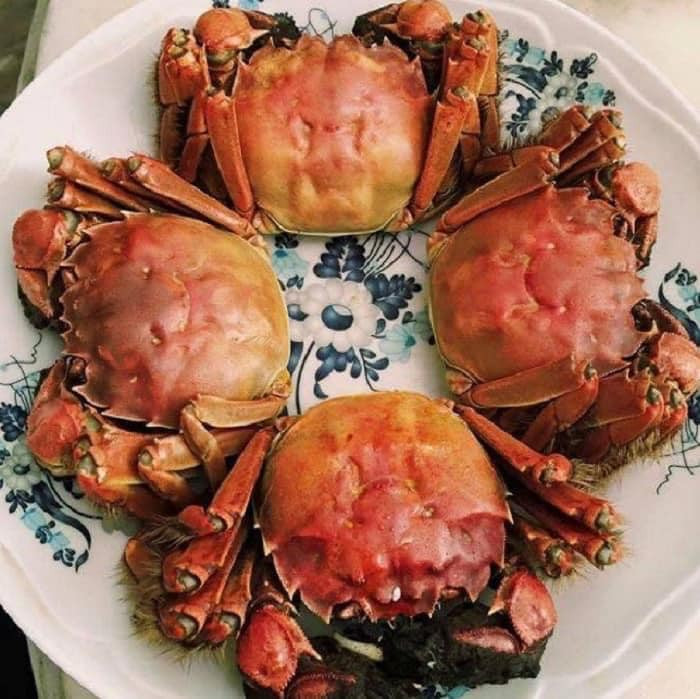 Để tránh mua phải cua lông giả, khách hàng có thể yêu cầu người bán cho xem phiếu gửi kèm hành lý chuyến bay từ Thượng Hải về Hà Nội. Nguồn ảnh: Facebook