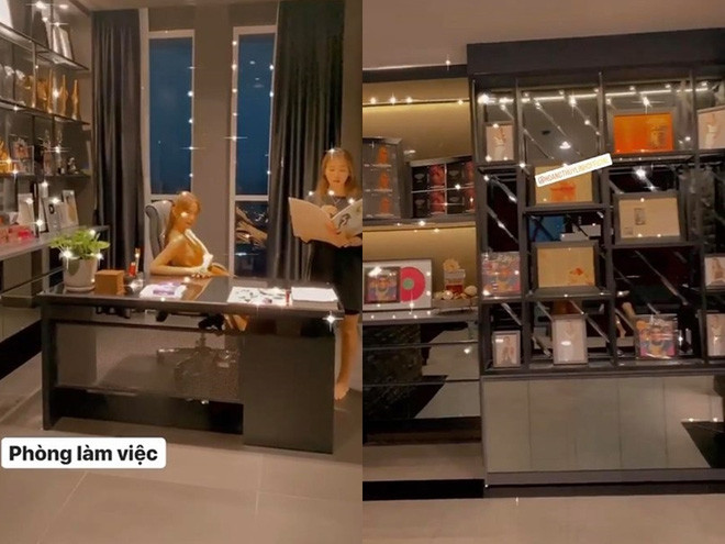 Trong khi đó, góc làm việc của Hoàng Thùy Linh có gam màu đen chủ đạo. Ngoài chiếc bàn lớn, sang trọng còn có tủ cao kịch trần trưng bày các giải thưởng âm nhạc.