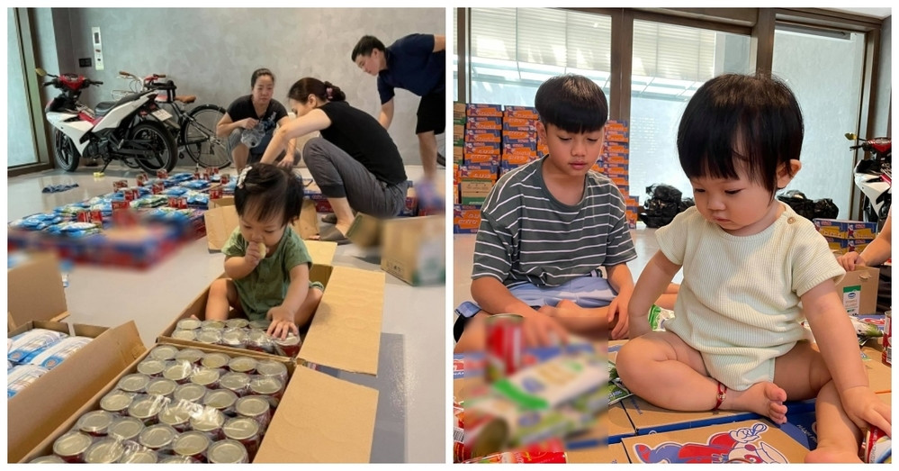 Hai thành viên nhí đều tham gia chuẩn bị phần quà tặng cho người dân. Ảnh: FBNV