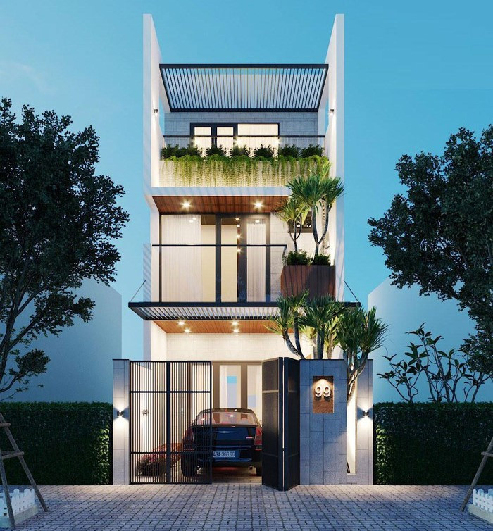 Nhà ống cao 3 tầng mang phong cách kiến trúc hiện đại. Mỗi tầng đều có cây xanh giúp điều hòa không khí. Ảnh: Xaydungphatdat