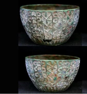 Trong khi ngôi mộ của thiếu nữ Anglo-Saxon có niên đại vào thế kỷ 6, chiếc cốc tráng men do người La Mã tạo ra vào thế kỷ 3. Điều này có nghĩa chiếc cốc có "tuổi đời" lớn hơn các hiện vật khác trong mộ cổ khoảng 300 tuổi.