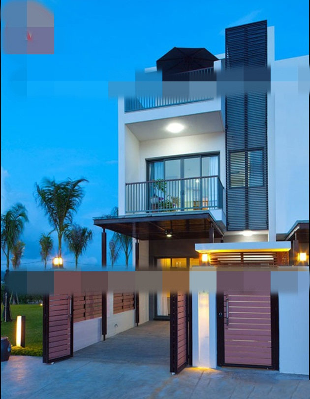 Tận dụng chiều dài đất 20m, gia chủ quyết định làm một sân trước rộng 6m làm một gara ôtô ngay trước phòng khách mà không làm hẹp đi diện tích sử dụng. Ảnh: Manhtoanthang.