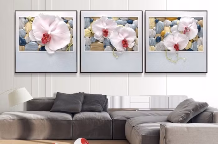 Bức tranh phù điêu 3D họa tiết lan hồ điệp tạo sự sang trọng cho không gian. Ảnh: Tuongxinh.