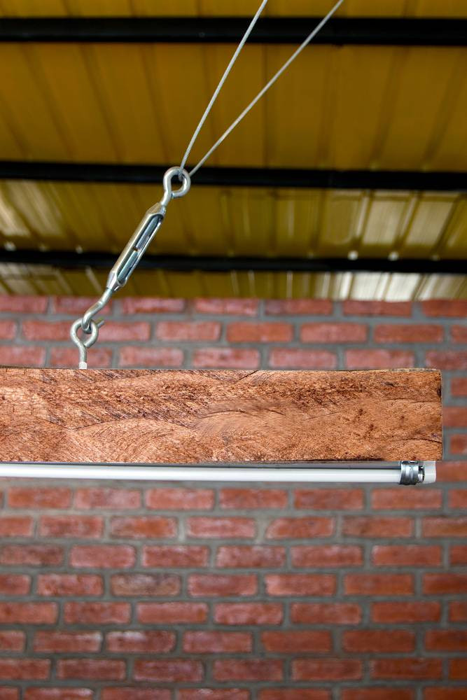 Các tấm pallet cũ cũng được tân trang và đưa vào tái sử dụng trong ngôi nhà cấp 4. Nguồn ảnh: Archilovers.