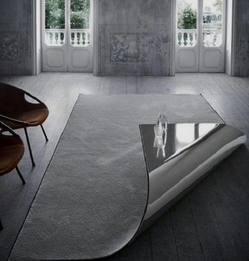 Bàn trà giống như được cuộn lên từ chiếc thảm trải sàn.