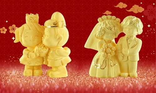 Tượng vàng Phu Thê thể hiện ước vọng về sự thủy chung, gắn bó bền chặt trong tình yêu. Ảnh: Lao động.