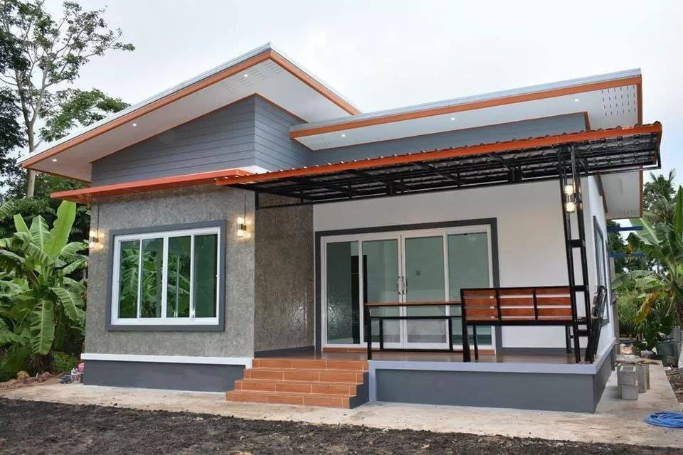 Các đường nét màu cam nổi bật trên màu sơn trắng - xám là điểm nhấn của căn nhà. Ảnh: Nhadattayninh.