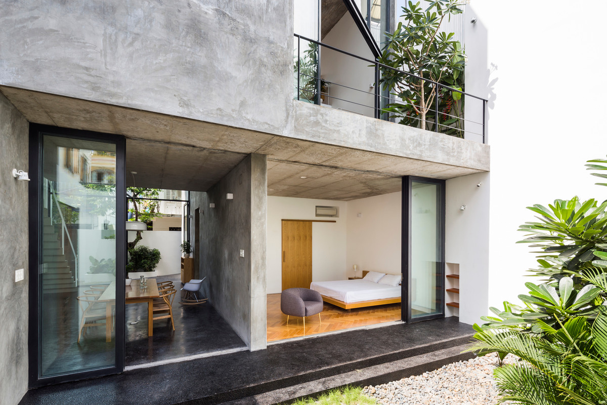 Các phòng ngủ chồng lên nhau theo hình zic zắc và tách biệt với khoảng thông tầng. Nguồn ảnh: Hiroyuki Oki.