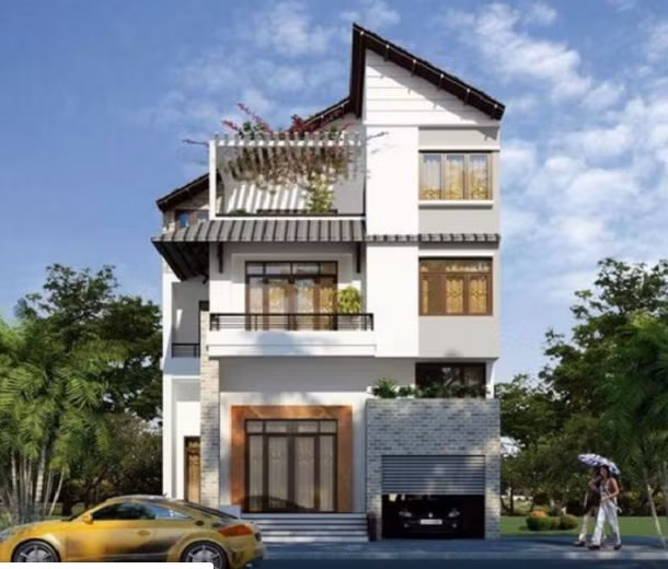 Nhà phố mái lệch bố trí mặt tiền hở, gara để xe rộng, bên trên có sân vườn vừa trang trí vừa có tác dụng chống nóng. Ảnh: Thietkepro.