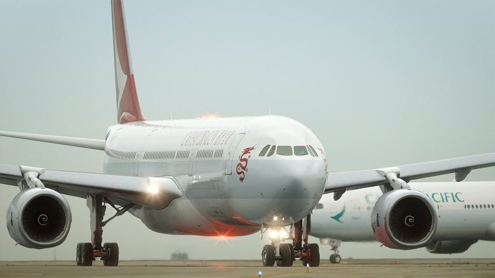 May bay Airbus cua Cathay Dragon phai ha canh khan cap
