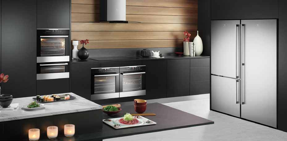 Sử dụng ít nhất một gam màu tối thể kết hợp thêm các gam màu sáng trong phòng bếp sẽ tạo nên sự tương phản trực quan hiện đại và trẻ trung. Ảnh: Happynest.