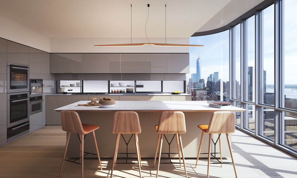 Khu vực bếp hiện đại có bàn ăn đủ cho 10 người.