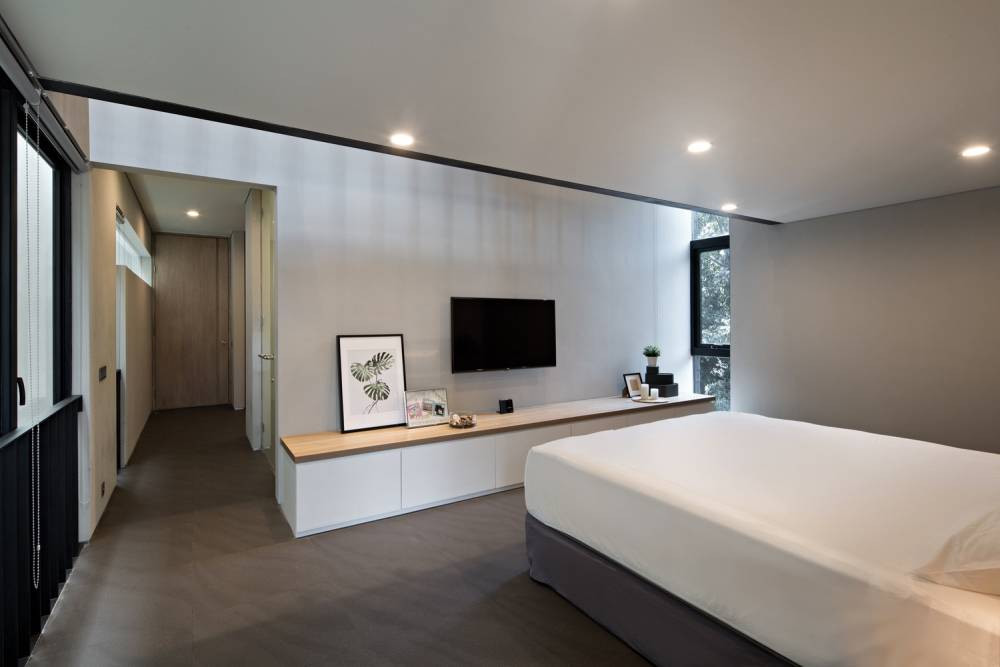 Phòng ngủ đơn hiện đại, sử dụng hai tone màu chủ đạo trắng - xám.