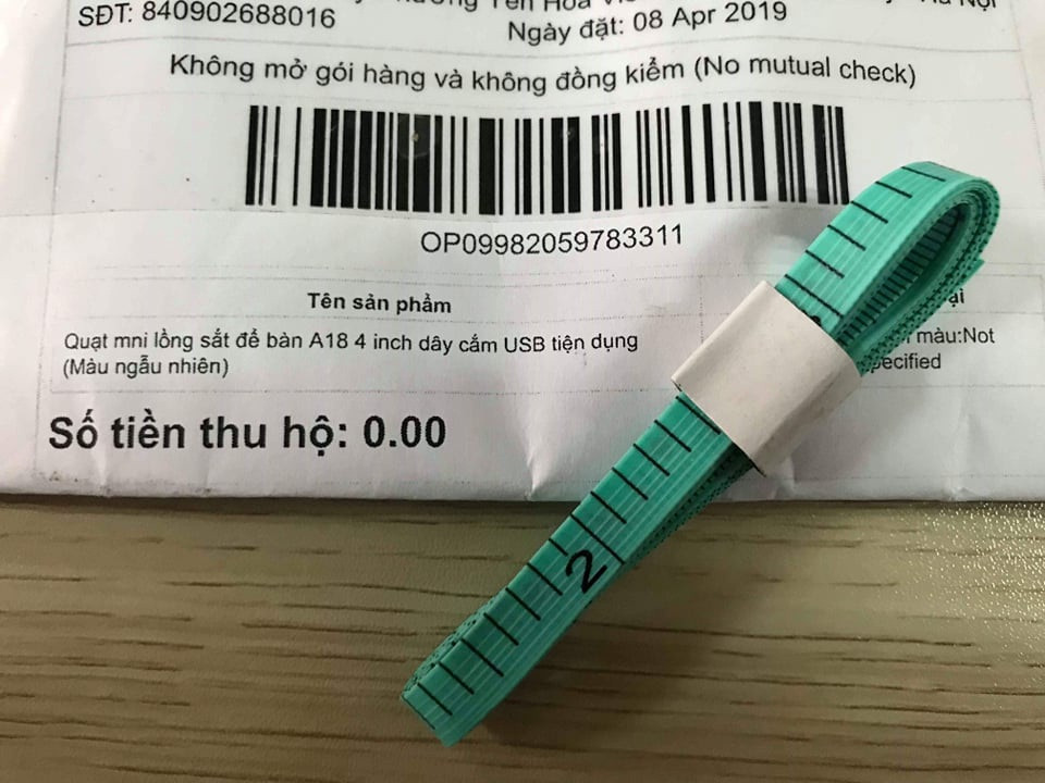 Mua quat mini long sat tren Lazada, khach nhan ve... thuoc day do vai-Hinh-2