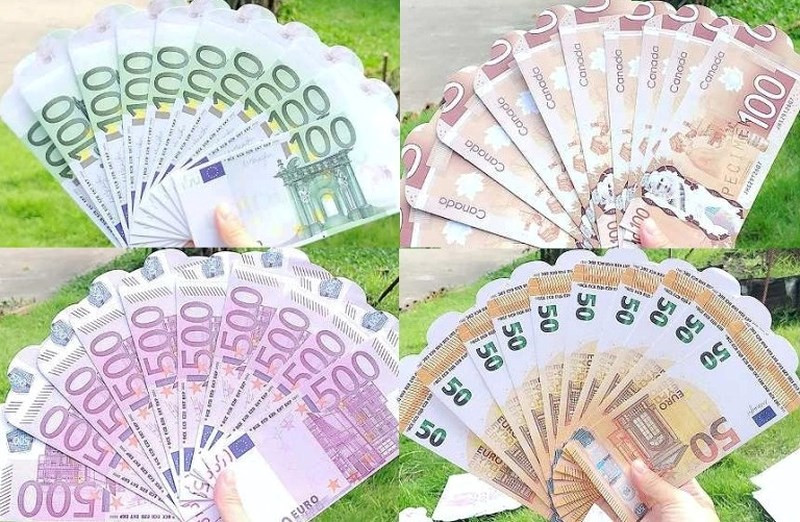  Lì xì in hình các tờ tiền nước ngoài bắt mắt. Ảnh: Infonet.