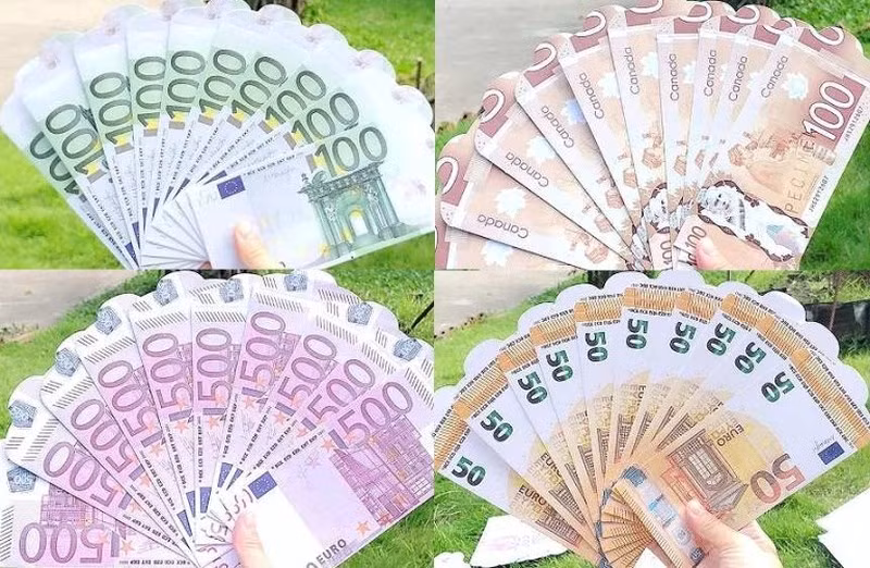  Lì xì in hình các tờ tiền nước ngoài bắt mắt. Ảnh: Infonet.