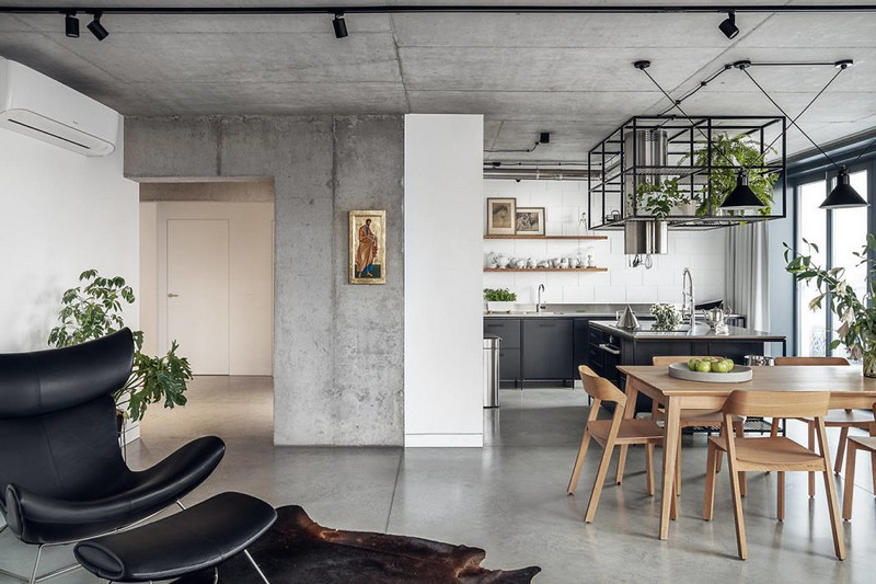 Không gian thô mộc với nội thất gỗ phủ dầu và các chất liệu tự nhiên như da và nỉ.